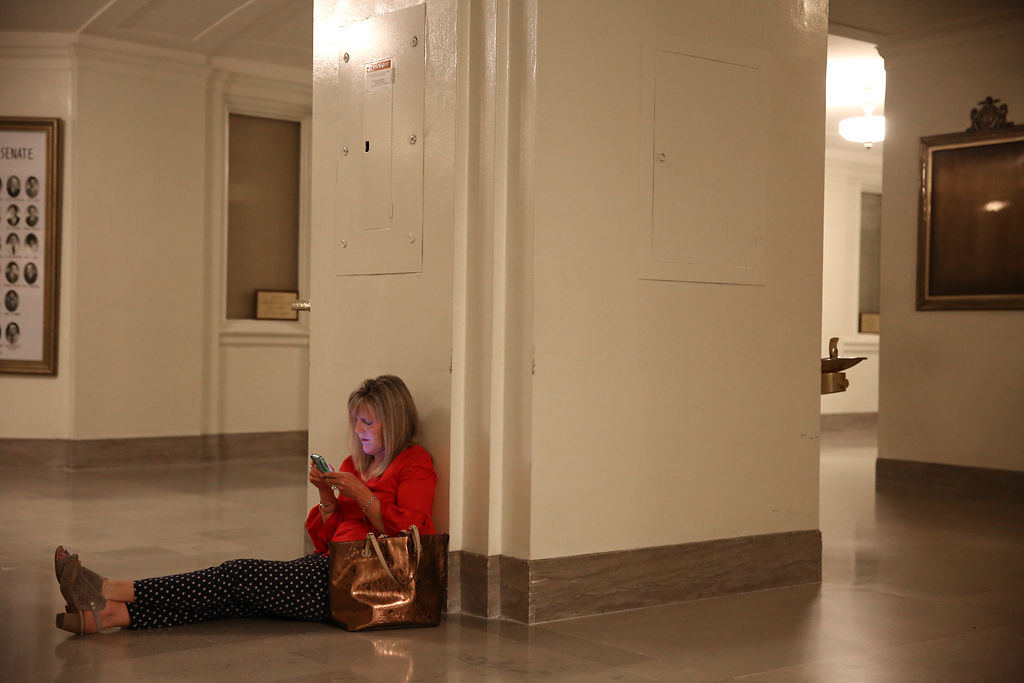 Ellen Korte sits in the halls of the Missouri State Capitol Building